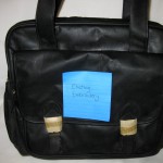 Black Travel Bag with pre-existing embroidery, $5 each, 8 available